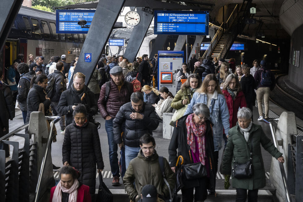 Commuters at a rail station