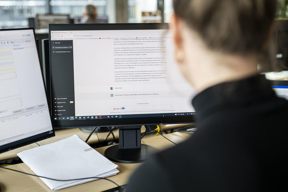 Woman sitting at office desk