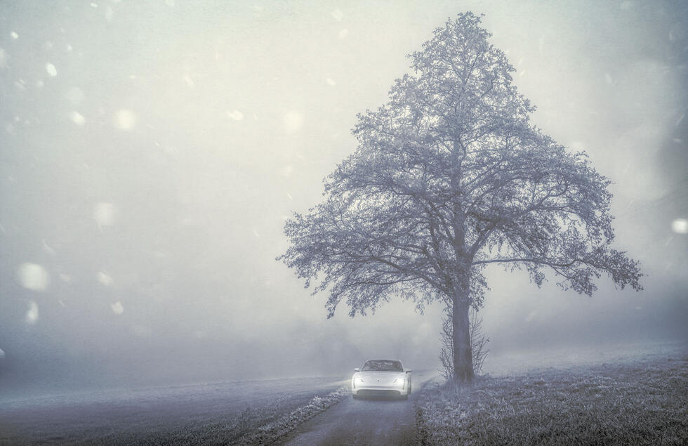 Porsche Taycan on a snow-covered road